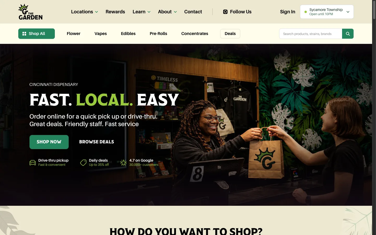 The Garden Dispensary website: The homepage: real in-store photography of a budtender handing over a branded kraft bag, next to the Fast. Local. Easy. headline